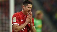 Striker Bayern Munchen Robert Lewandowski tampil pada laga melawan Borussia Monchengladbach di Allianz Arena, Munchen, 22 Oktober 2016. (AFP/Christof Stache)