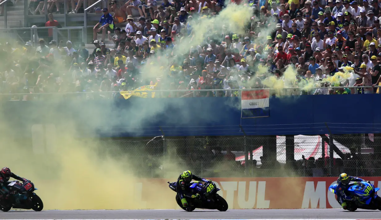 Suasana balapan MotoGP Belanda di Sirkuit Assen, Belanda, Minggu (30/6/2019). Vinales sukses menjadi juara dengan catatan waktu 40 menit 55,415 detik. (AP//Peter Dejong)