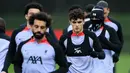Pemain Liverpool Stefan Bajcetic (tengah) dan rekan satu timnya mengambil bagian dalam sesi latihan tim di Pusat Pelatihan AXA, Liverpool, Inggris, 20 Februari 2023. Liverpool akan menghadapi pertandingan sepak bola leg pertama babak 16 besar Liga Champions UEFA melawan Real Madrid. (Lindsey Parnaby/AFP)