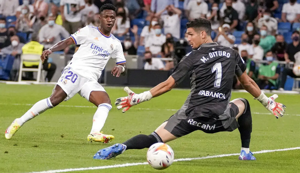 Adapun dua gol lainnya milik Madrid dicetak Vinicius Junior pada menit ke-54 dan Eduardo Camavinga menit ke-72. (Foto:AP/Manu Fernandez)