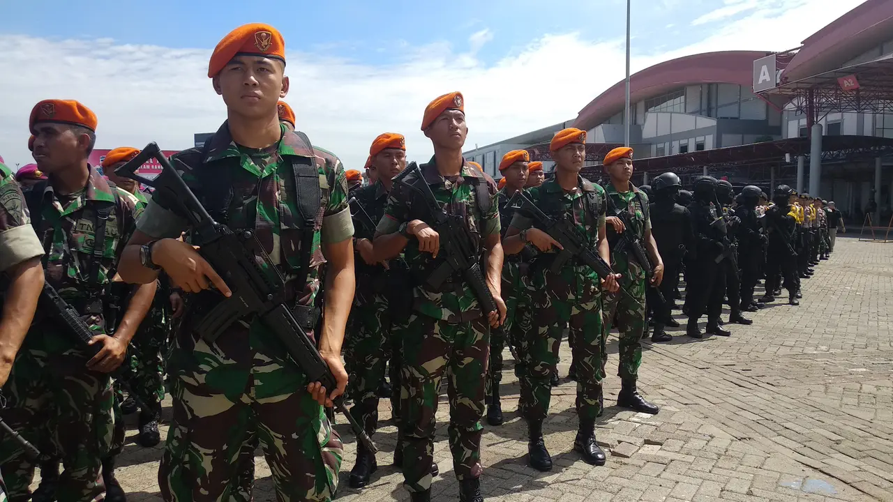 Polri dan TNI menggelar apel patroli skala besar di JiExpo, Kemayoran, Jakarta Pusat, Minggu (14/4/2019) untuk mengamankan Pemilu 2019.