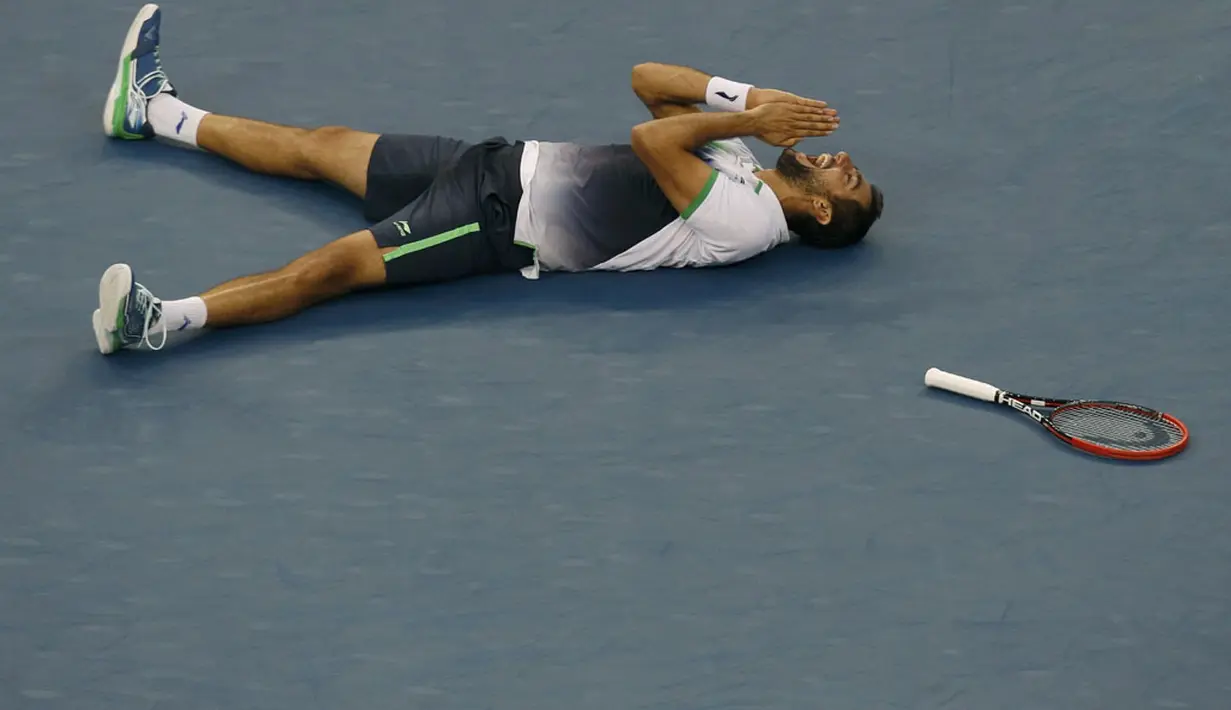 Selebrasi petenis Kroasia, Marin Cilic, usai menumbangkan Kei Nishikori (Jepang) di final tunggal putra turnamen tenis US Open 2014, New York, (8/9/2014). (REUTERS/Shannon Stapleton)