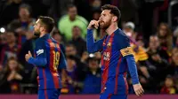 Striker Barcelona Lionel Messi merayakan gol ke gawang Celta Vigo pada laga La Liga di Camp Nou, Barcelona, Sabtu (4/3/2017). (AFP/Lluis Gene)