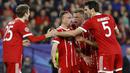 Pemain Bayern merayakan gol ke gawang Sevilla pada leg pertama Liga Champions di Sanchez Pizjuan stadium, Seville, (3/4/2018) waktu setempat. Beyern menang 2-1. (AP/Miguel Morenatti)