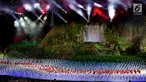 Atlet kontingen Indonesia memasuki stadion pada pembukaan Asian Games 2018 di Stadion Utama Gelora Bung Karno (SUGBK), Jakarta, Sabtu (18/8). Atlet renang I Gede Siman Sudartawa dipercaya menjadi pembawa bendera Merah Putih. (Liputan6.com/Ferbian Pradolo)