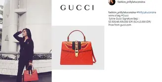 Tas Prilly Latuconsina warna oranye ini bermerek Gucci. Tas berharga Rp 45 juta. (Foto: instagram.com/fashion_prillylatuconsina)