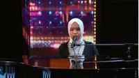 Penyanyi asal Indonesia Putri Ariani menjadi sorotan publik setelah tampil di America&rsquo;s Got Talent dan mendapatkan Golden Buzzer. (Foto: tangkapan layar Twitter America's Got Talent/AGT)