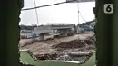 Suasana proyek pembangunan Tol Becakayu seksi 1A di kawasan Pasar Gembrong, Jakarta, Selasa (14/7/2020). Proyek pembangunan Tol Becakayu seksi 1A rute Kampung Melayu-Cipinang Muara sepanjang 3,5 kilometer tersebut molor dari target. (merdeka.com/Iqbal S. Nugroho)