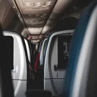 Ilustrasi pesawat terbang. (dok. unsplash.com/Asnida Riani)