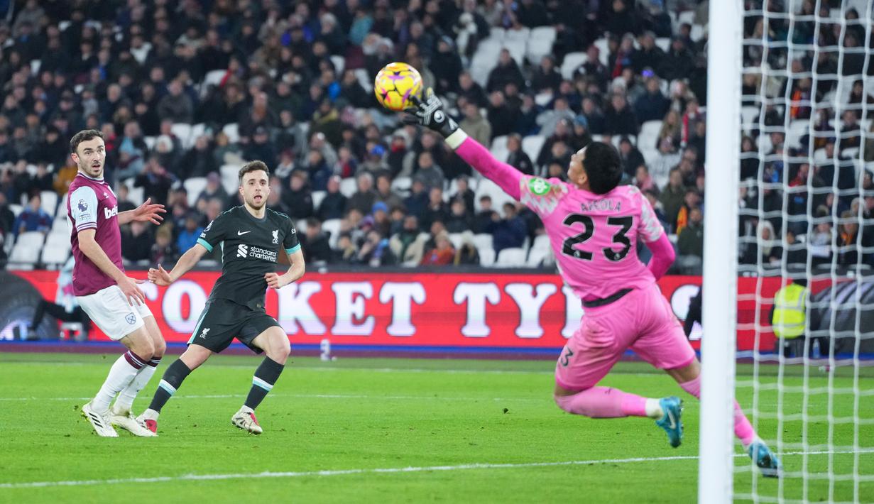 Kemenangan ini mengukuhkan posisi Liverpool di puncak klasemen sementara Liga Inggris 2024/2025 dengan 45 poin dari 18 laga. (AP Photo/Kirsty Wigglesworth)