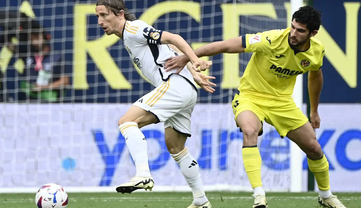 Sementara itu, Villarreal menduduki peringkat kedelapan dengan poin 52. (JOSE JORDAN / AFP)