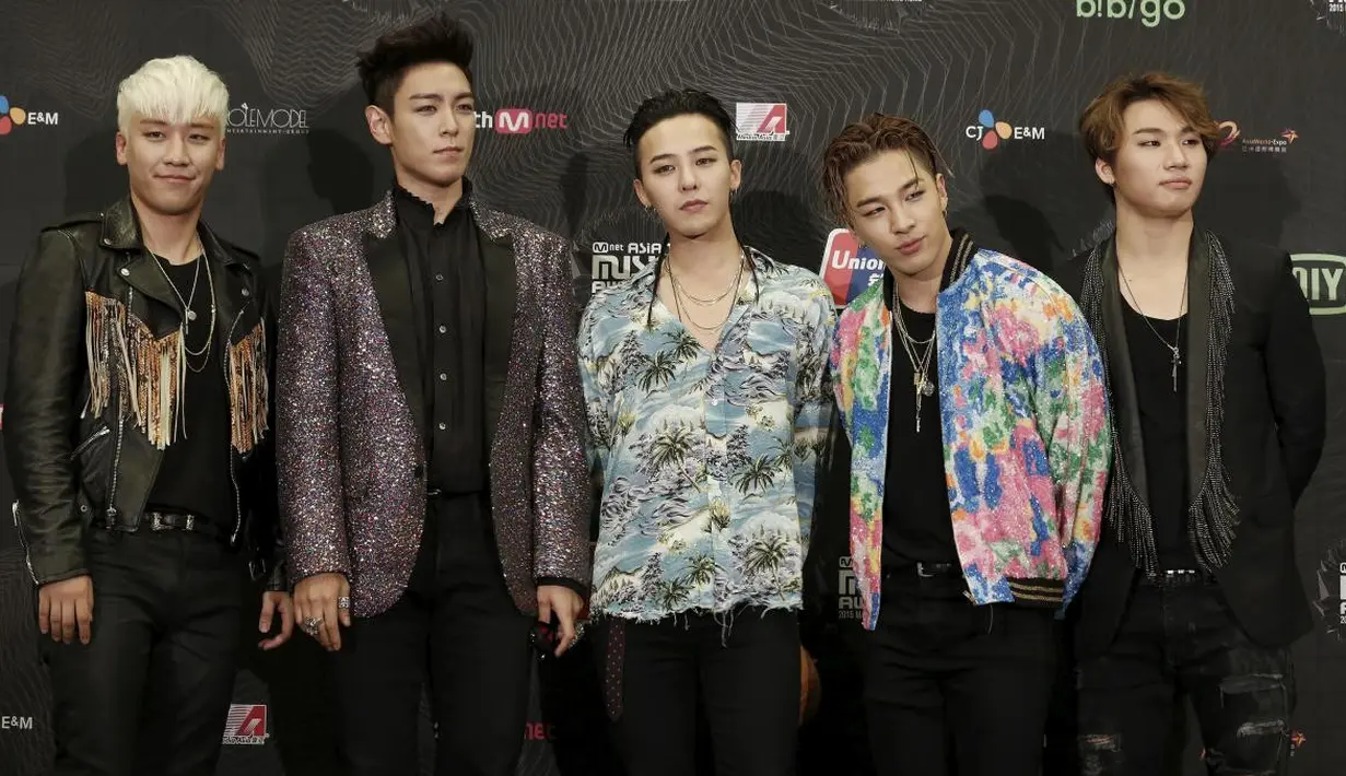 Seperti diketahui, G-Dragon memulai wamilnya pada 27 Februari. Sedangkan T.O.P terlebih dahulu berangkat wajib militer. (Foto: ibtimes.com)