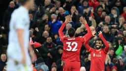 Pada menit ke-30, Joel Matip berhasil menggandakan keunggulan Liverpool usai memanfaatkan umpan Mohamed Salah. (AFP/Lindsey Parnaby)