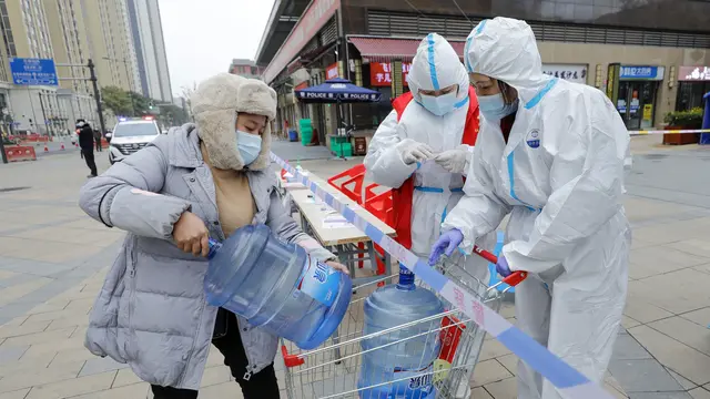 FOTO: Aksi Komunitas di China Antar Kebutuhan Warga yang Dikarantina Akibat COVID-19