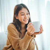 Perempuan bahagia./Copyright&nbsp;shutterstock.com/g/oatawa