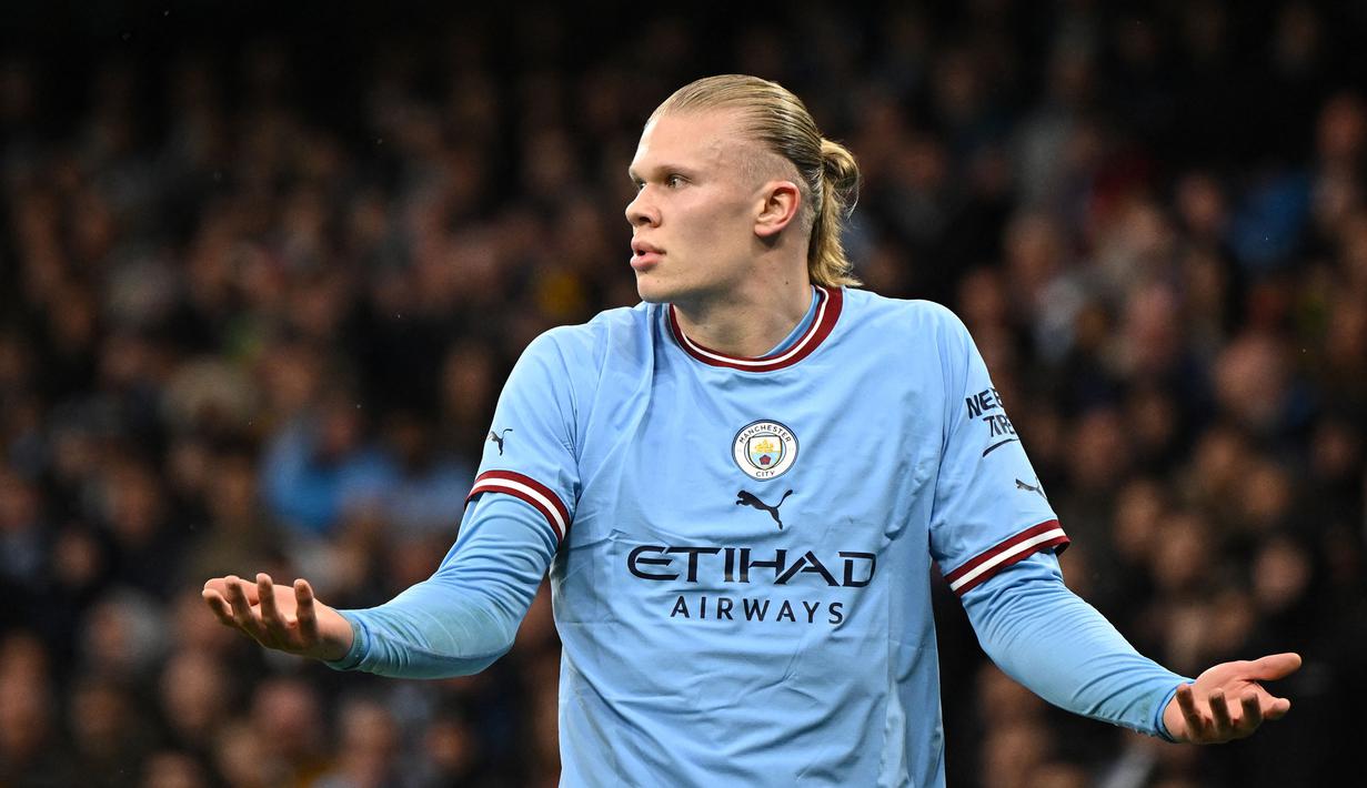 Reaksi pemain Manchester City, Erling Haaland pada laga perempat final FA Cup 2022/2023 melawan Burnley yang berlangsung di Etihad Stadium, Manchester, Minggu (19/03/2023) WIB. Haaland sukses mencetak hattrick untuk kemenangan 6-0 The Cityzens. (AFP/Oli Scarff)