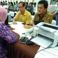Wajib Pajak berbondong-bondong mendatangi Kantor Pelayanan Pajak (KPP) Tanah Abang 2 untuk menyerahkan laporan SPT Tahunan. (Liputan6.com/Fiki Ariyanti)