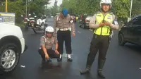 Polwan tertabrak hingga luka parah di Bogor (Achmad Sudarno/Liputan6.com)