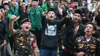 Anggota dan simpatisan Barisan Ansor Serbaguna (Banser) saat berunjuk rasa di depan gedung Merah Putih Komisi Pemberantasan Korupsi (KPK), Jakarta, Kamis (12/3/2026). (Liputan6.com/Helmi Fithriansyah)