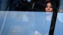 Ekspresi Kim Kardashian saat menyaksikan pertandingan Ligue 1 antara PSG melawan Rennais, Minggu (19/3/2023) malam WIB. Sebelumnya, Kim menyaksikan duel Arsenal melawan Sporting Lisbon di babak 16 Besar Liga Europa. Hasilnya, Arsenal kalah pada babak adu penalti. (AFP/Frank Fife)