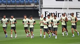 Real Madrid menggelar sesi latihan terbuka jelang laga perdana mereka di La Liga musim 2025/2026. (JAVIER SORIANO/AFP)