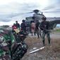 Pasukan TNI diserang KKB saat patroli di Distrik Kenyam, Nuda, Papua, Kamis (26/11/2020). Tiga prajurit yang terluka dievakuasi menggunakan helikopter. (Dok Puspen TNI)