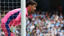 Kiper Manchester City asal Inggris #01, James Trafford, bereaksi selama pertandingan Premier League antara Manchester City dan Tottenham Hotspur di Stadion Etihad di Manchester, Inggris barat laut, pada 23 Agustus 2025. (Darren Staples/AFP)