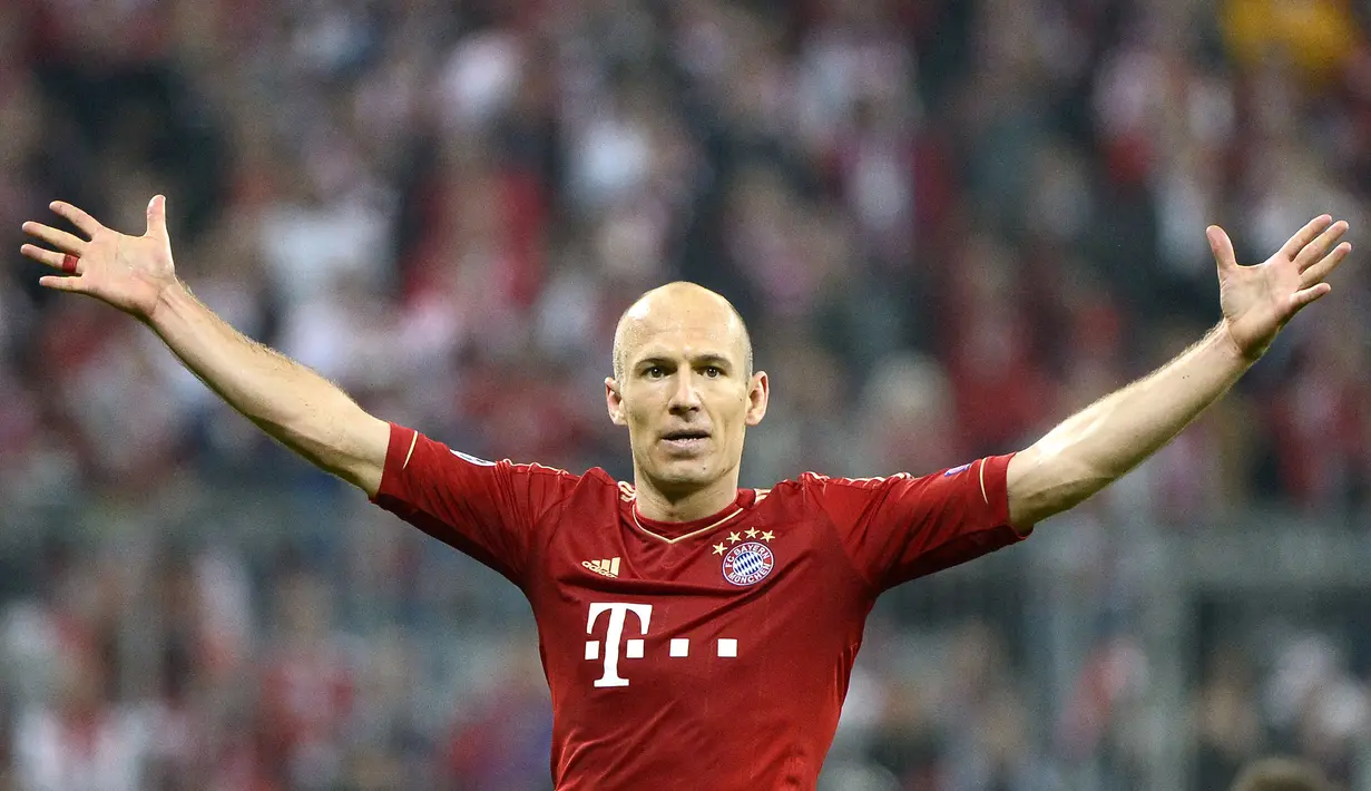 Arjen Robben didatangkan ke Bayern Munchen ketika Louis Van Gaal sedang melakukan perbaikan di lini depannya. Selama kariernya di Allianz, pemain Belanda tersebut mampu memenangkan 20 trofi bersama Die Roten, salah satunya gelar Bundesliga dan trofi Liga Champions. (AFP/Pierre-Philippe Marcou)