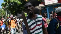 Demonstran menuntut lengsernya Presiden Haiti Jovenel Moïse.(AFP/Chandan Khann)