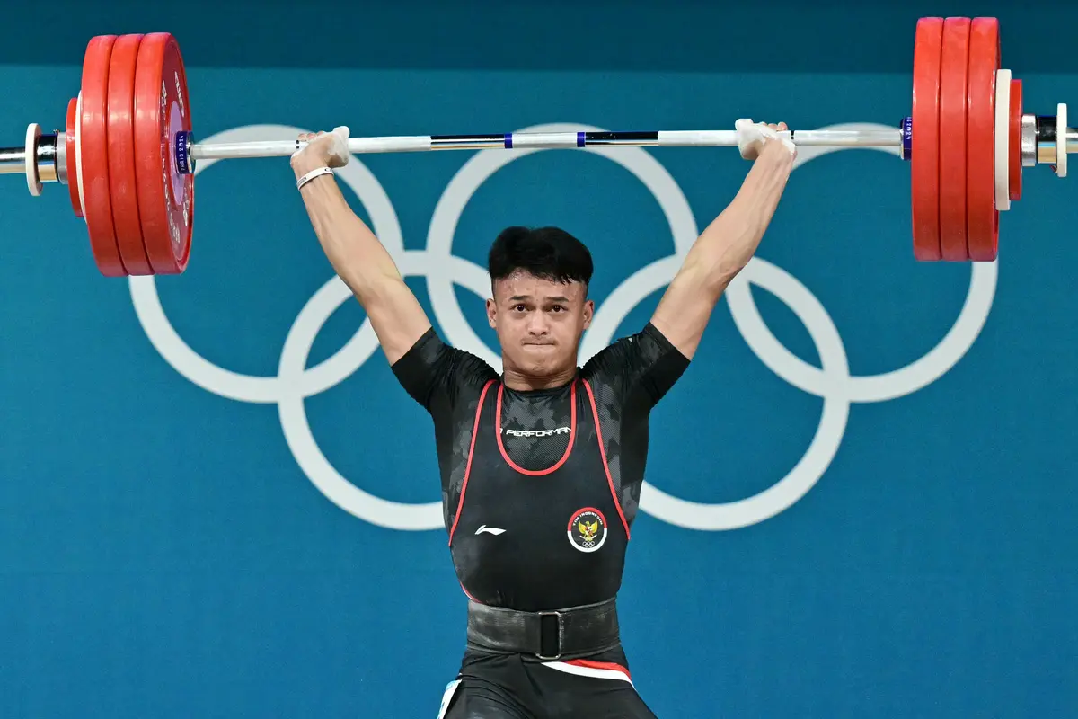 Foto: Ragam Ekspresi Si Jawara Banten Rizki Juniansyah Saat Berjuang Meraih Medali Emas Olimpiade 2024