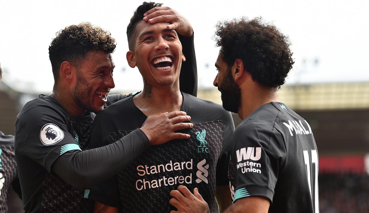 2. Roberto Firmino (Liverpool / 14 Gol dari 24 laga Liga Champions) - Awalnya lebih cocok sebagai second striker tapi musim lalu berhasil membuktikan diri sebagai ujung tombak The Reds meraih trofi Champions. (AFP/Glyn Kirk)