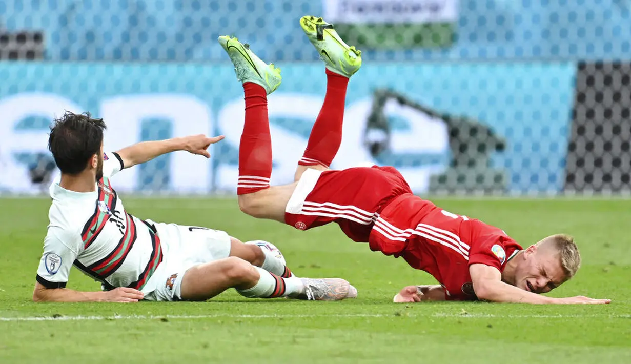 Penampilan disiplin Hungaria benar-benar membuat sang juara bertahan Portugal kesulitan menembus lini pertahanan lawan. (Tibor Illyes/Pool via AP)