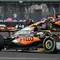 Pembalap McLaren, Lando Norris dan Oscar Piastri memacu mobilnya saat balapan Formula 1 GP Inggris di Sirkuit Silverstone, Inggris, 9 Juli 2023. (AFP/Andrej Isakovic)