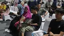 Layanan 1.075 paspor dalam rangka Hari Bhakti Imigrasi Ke-75 ini bertujuan memberi kemudahan bagi masyarakat yang tidak memiliki waktu mengurus paspor pada hari kerja. (Liputan6.com/Angga Yuniar)