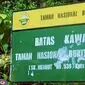 Plang perbatasan Taman Nasional Bukit Tiga Puluh di Riau. (Liputan6.com/M Syukur)
