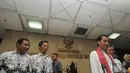 Jokowi tiba sekitar pukul 08.00 WIB, dengan mengenakan baju koko berwarna putih dipadu selendang kotak-kotak warna merah muda. , Jakarta, Jumat (23/5/2014) (Liputan6.com/Herman Zakharia)