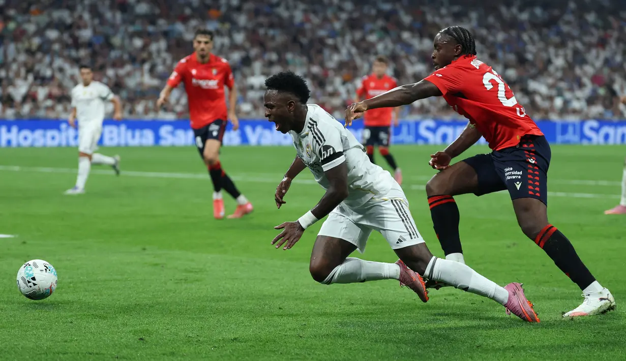 Pihak Vinicius Jr telah menyodorkan kontrak baru sebanyak dua kali pada akhir Desember tahun lalu dan awal Mei ini. Sayangnya, perundingan tersebut tak menemui titik terang. (AFP/Thomas Coex)