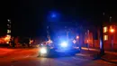 Polisi memblokir jalan-jalan di depan sebuah kantor polisi di Georgia Tech dimana terjadi demonstrasi sebelumnya dan setidaknya satu mobil polisi dibakar di Atlanta (18/9). (Foto AP / Kevin D. Liles)