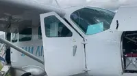 Pesawat SAM Air tergelincir saat mendarat di lapangan terbang Beoga di Kabupaten Puncak, Provinsi Papua, Senin (23/1/2023). (Liputan6.com/ Ist)
