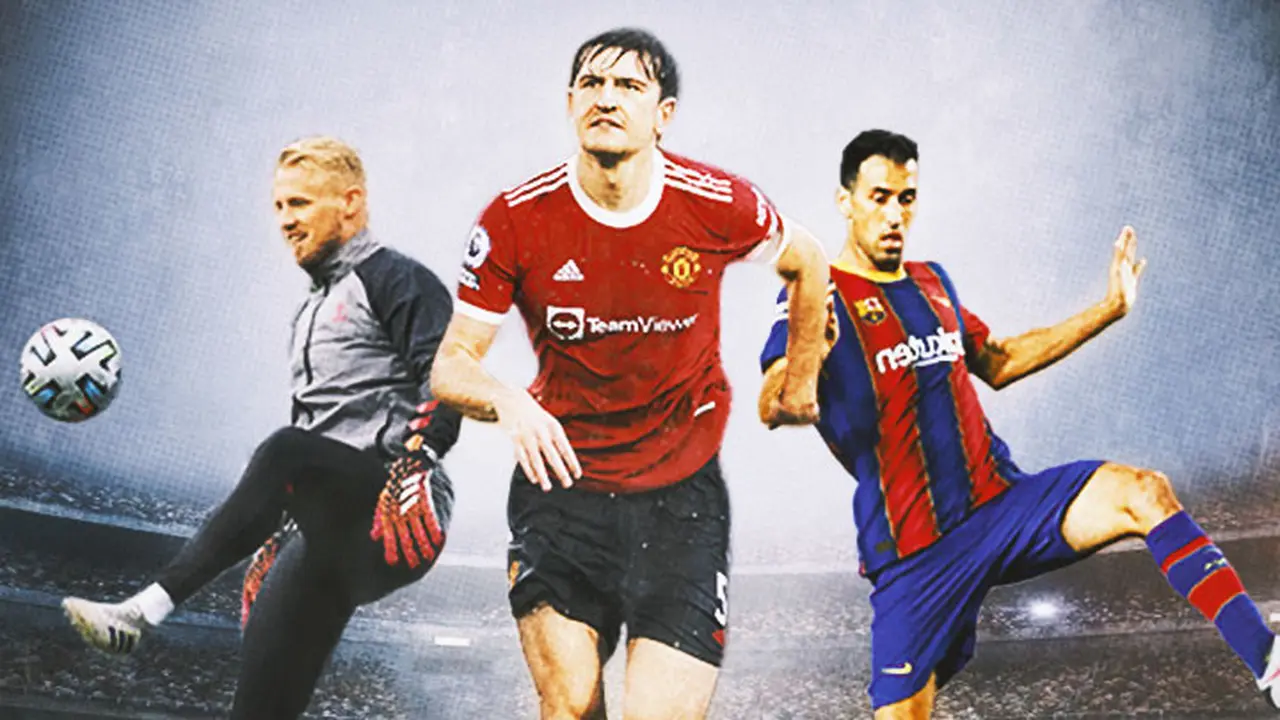 Ilustrasi - Harry Maguire dikelililingi Sergio Busquets Kasper Schmeichel