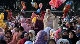 Hampir 9.000 Muslim berkumpul di Manila untuk merayakan Idul Adha atau Hari Raya Kurban pada Rabu, 28 Juni. (AFP/JAM STA ROSA)