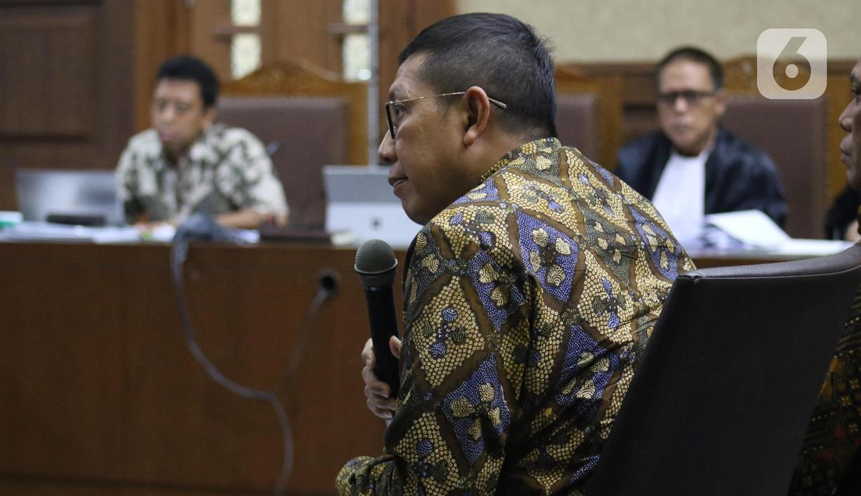 Mantan Menteri Agama, Lukman Hakim Saifuddin saat menjadi saksi pada sidang lanjutan dugaan suap jual-beli jabatan di lingkungan Kemenag dengan terdakwa M Romahurmuziy di Pengadilan Tipikor Jakarta, Rabu (4/12/2019). Sidang beragenda mendengar keterangan saksi. (Liputan6.com/Helmi Fithriansyah)