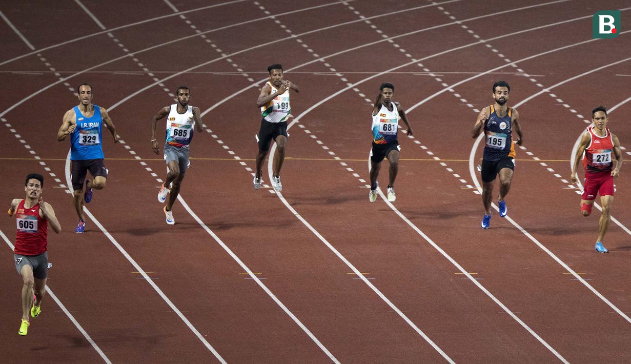 Ferry Pradana meraih medali perak di cabang para atletik nomor lari 400 meter putra klasifikasi T45/46/47 pada Asian Para Games 2018, di Stadion Utama Gelora Bung Karno Jakarta, Kamis(11/10/2018).  (Bola.com/Peksi Cahyo)