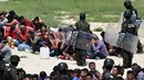 <p>Tak sampai disitu, pemerintah Honduras juga akan melatih 2.000 penjaga penjara baru. (Orlando SIERRA/AFP)</p>