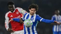 The Gunners menang dengan skor tipis 1-0 melalui gol semata wayang Bukayo Saka pada menit kesembilan. (AFP/Glyn Kirk)