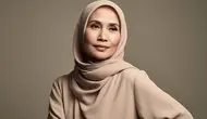 Model gamis terbaru untuk wanita usia 50-an (created by Meta AI)