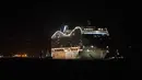 Kapal pesiar MSC World Europa meninggalkan pelabuhan Saint-Nazaire, Prancis barat pada 26 Oktober 2022. MSC World Europa dilengkapi dengan sistem propulsi gas alam cair (LNG). (AFP/Sebastien Salom Gomis)