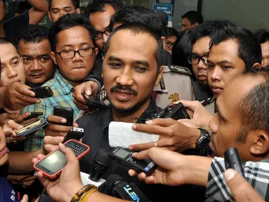 Ketua Komisi Pemberantasan Korupsi (KPK) Abraham Samad saat menjawab pertanyaan wartawan di kantornya, Jakarta, (22/10/14). (Liputan6.com/Miftahul Hayat) 