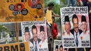 Dalam aksinya, massa juga membawa poster-poster gambar Hatta Rajasa dan Muhammad Riza Chalid, Jakarta, Kamis (3/7/14). (Liputan6.com/Miftahul Hayat) 