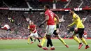 Pemain Manchester United Anthony Martial mencetak gol ke gawang Watford pada pertandingan Liga Inggris di Old Trafford, Manchester, Inggris, Minggu (23/2/2020). Manchester United menang 3-0. (Martin Rickett/PA via AP)